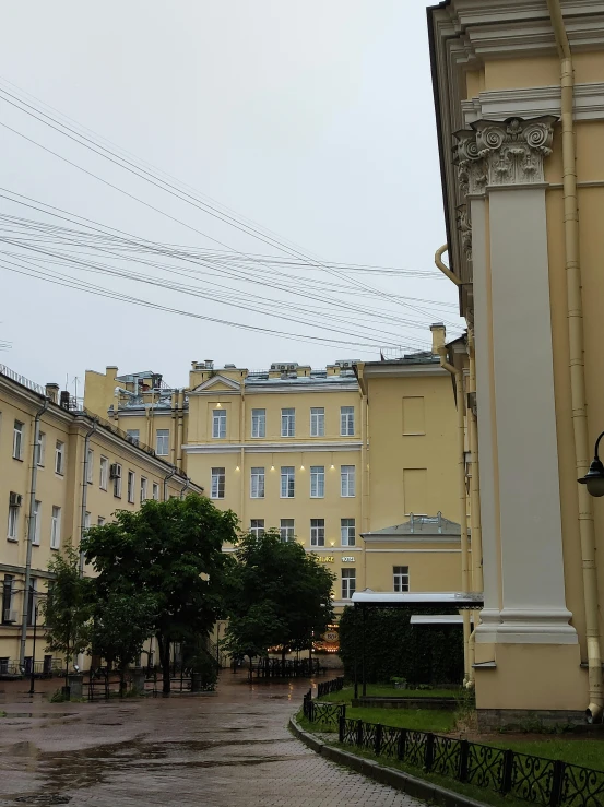 some big buildings that have power lines overhead