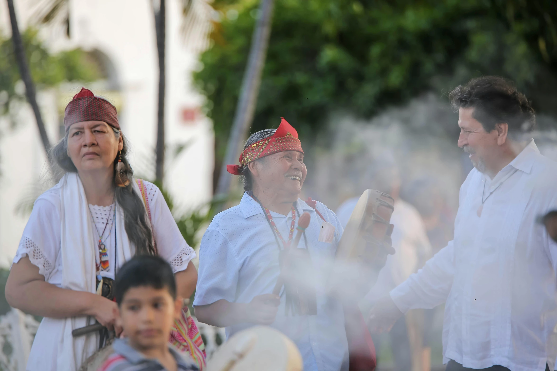 a group of people wearing traditional mexican clothing