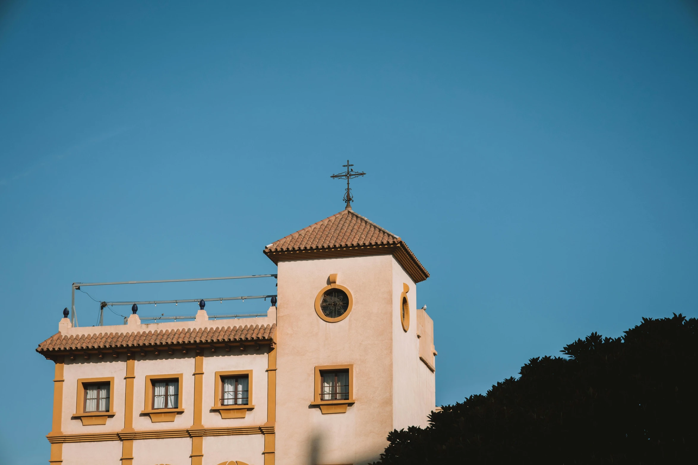 a small clock on the side of a building