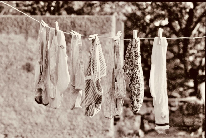 several towels hung on a clothesline outside