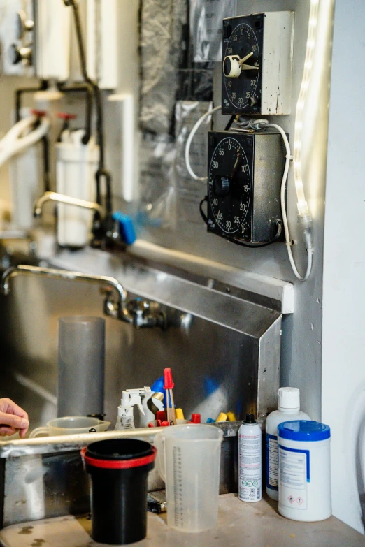 man in a kitchen working on an item to be sold