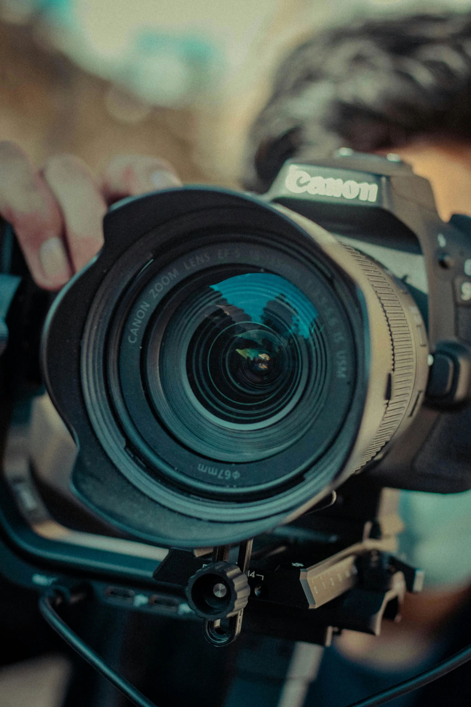 a closeup s of someone holding a camera