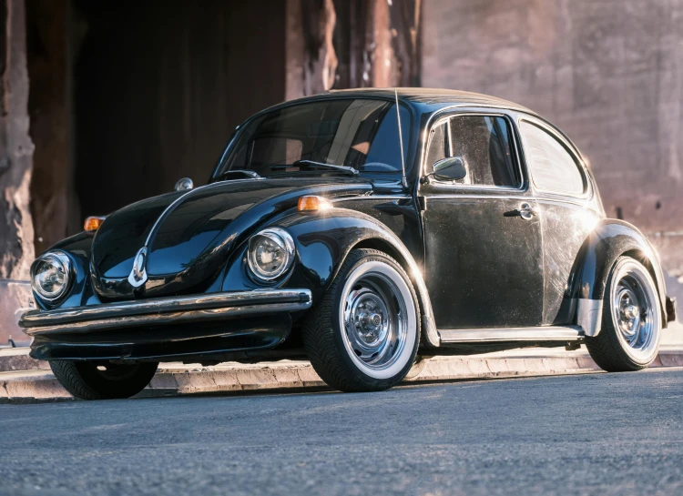 black and gray car parked in front of an old building