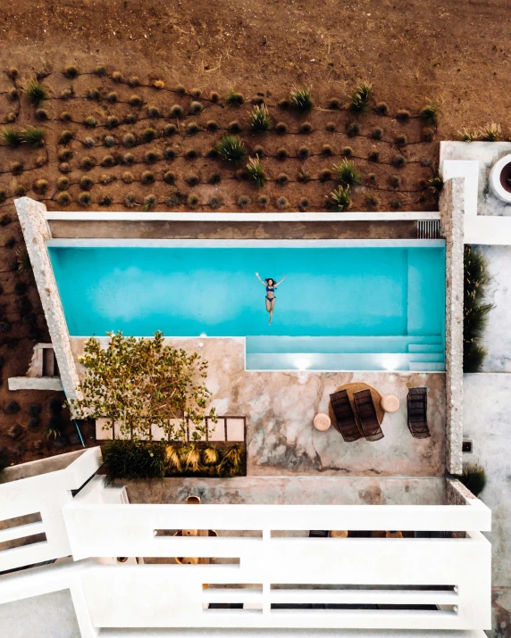 an aerial s of a small pool that looks like a garden