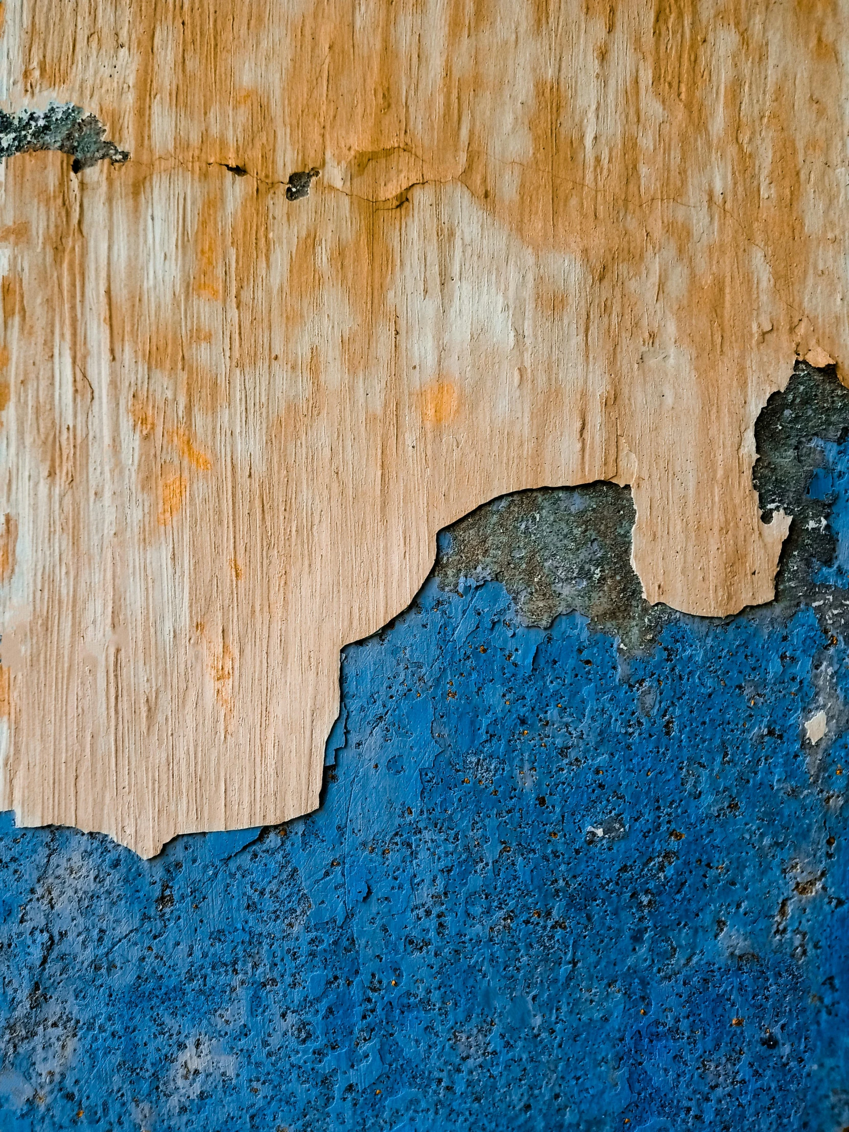 this is a pograph of wood with peeling paint