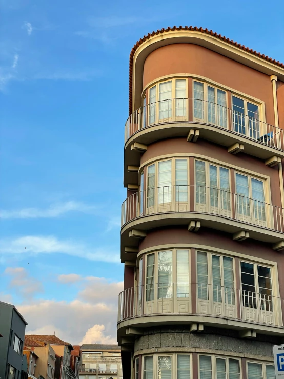 a tall building with a balconies on the side