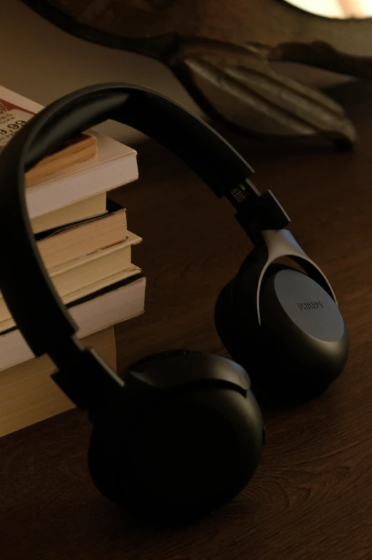 a pair of headphones sitting on top of a desk