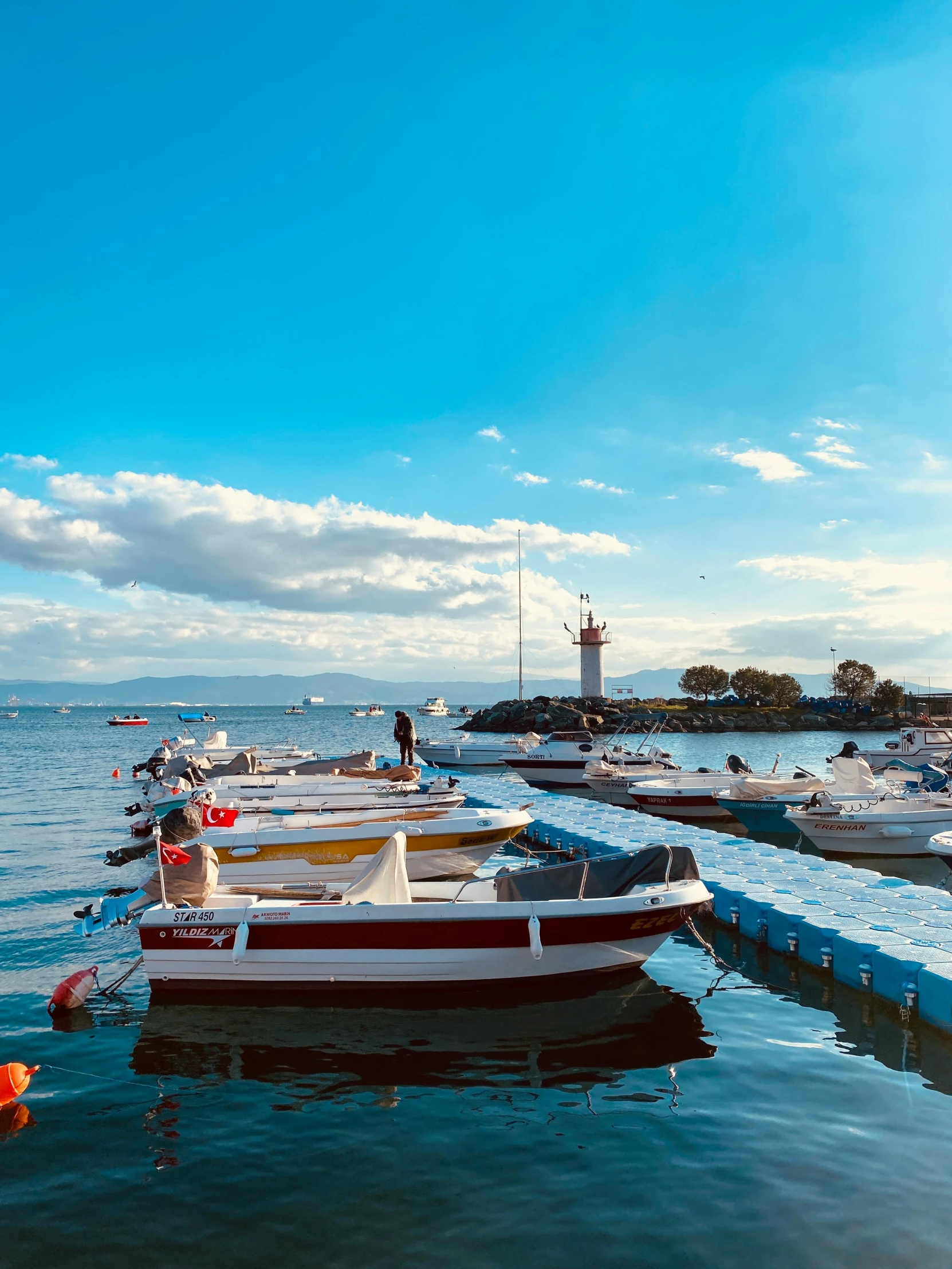 there are several boats tied to the dock