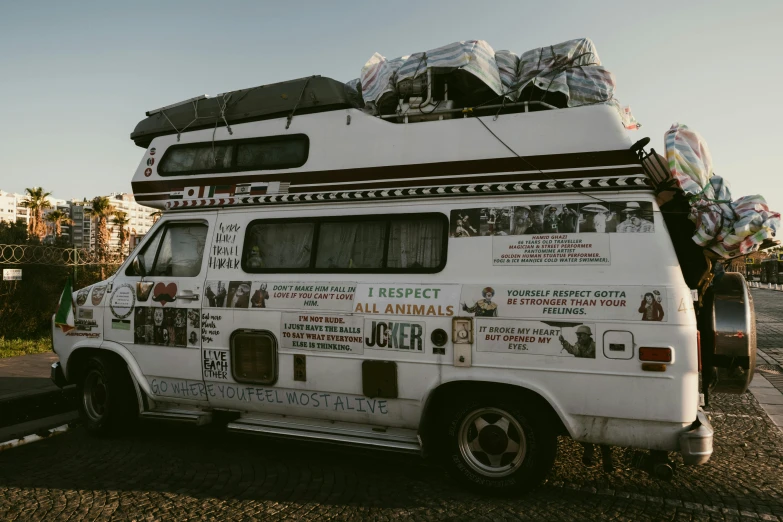 there is a very small truck that has many stuff on top