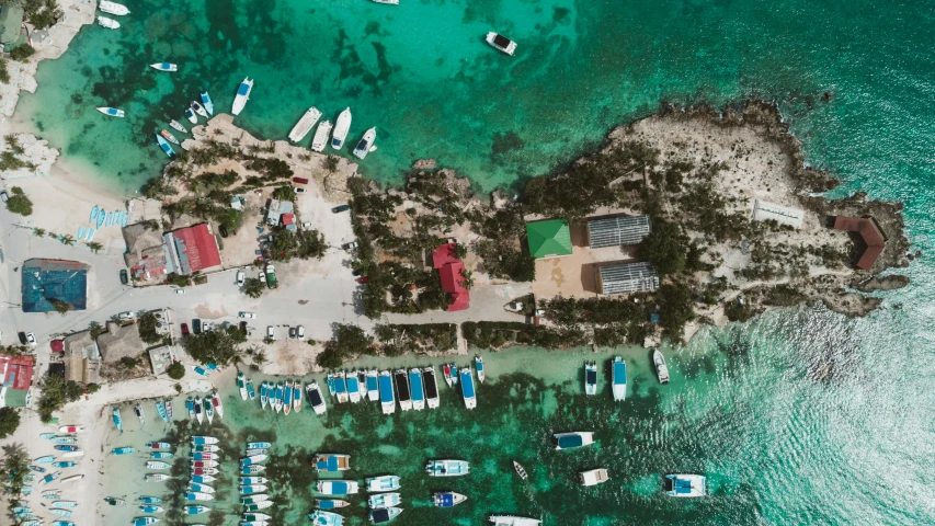 an island has several different colored boats on it