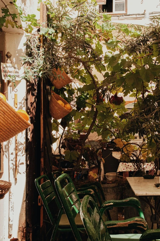 a view of chairs and tables in a courtyard