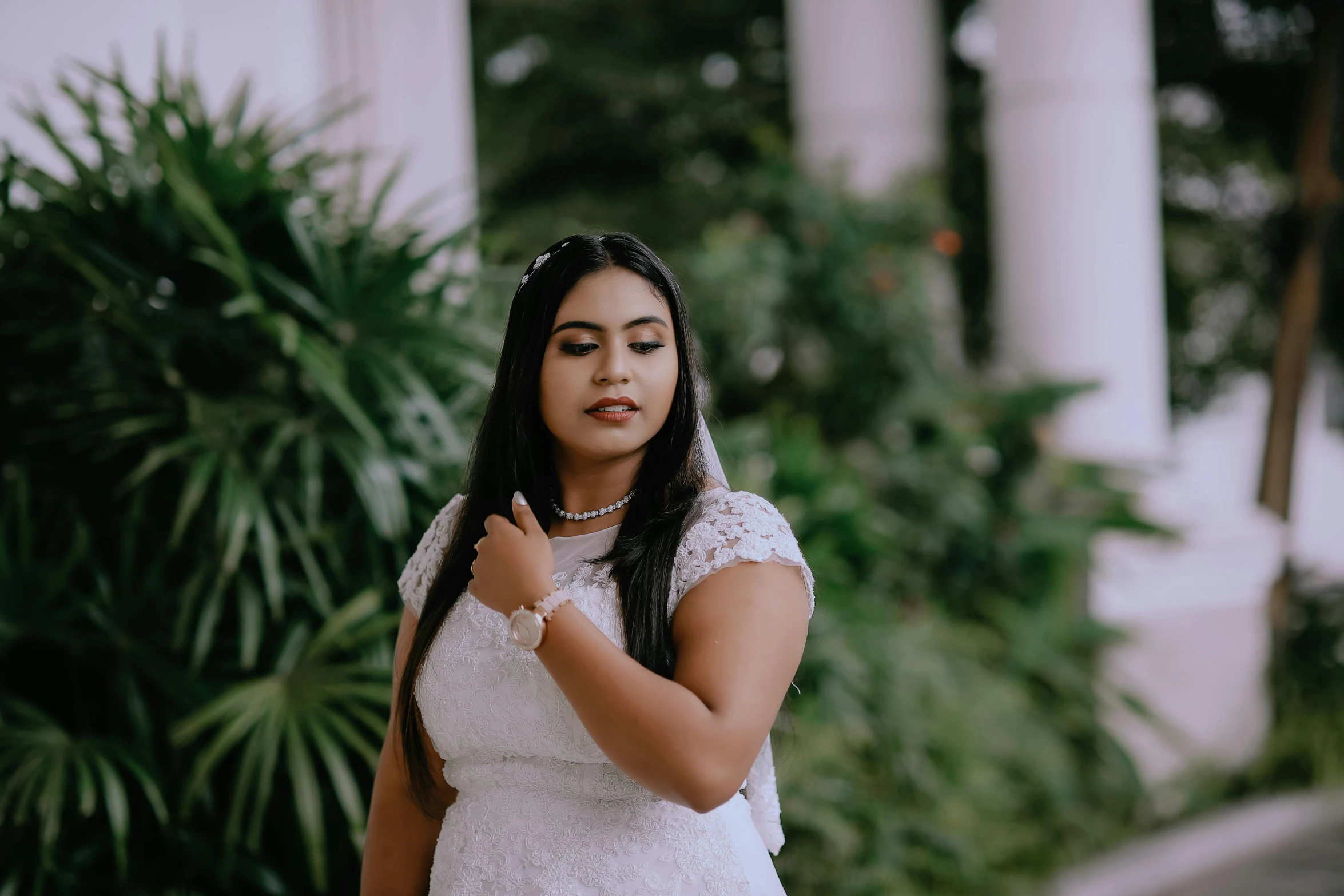 a beautiful woman wearing a dress with long hair