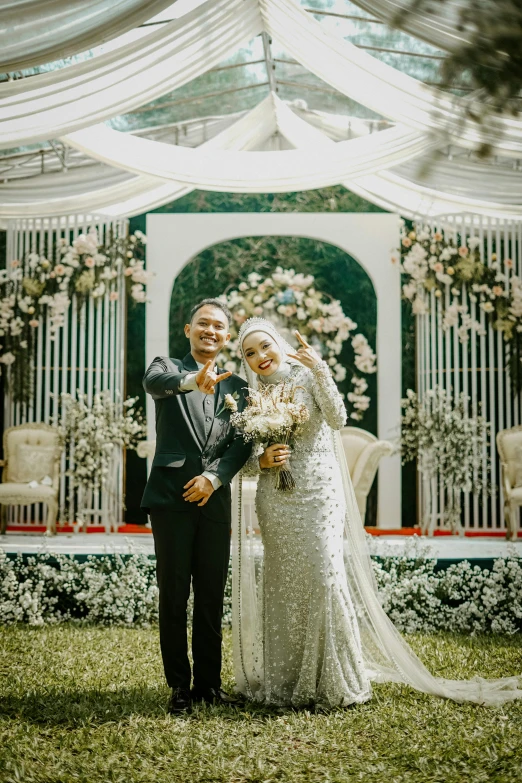 an image of a bride and groom outside at their wedding