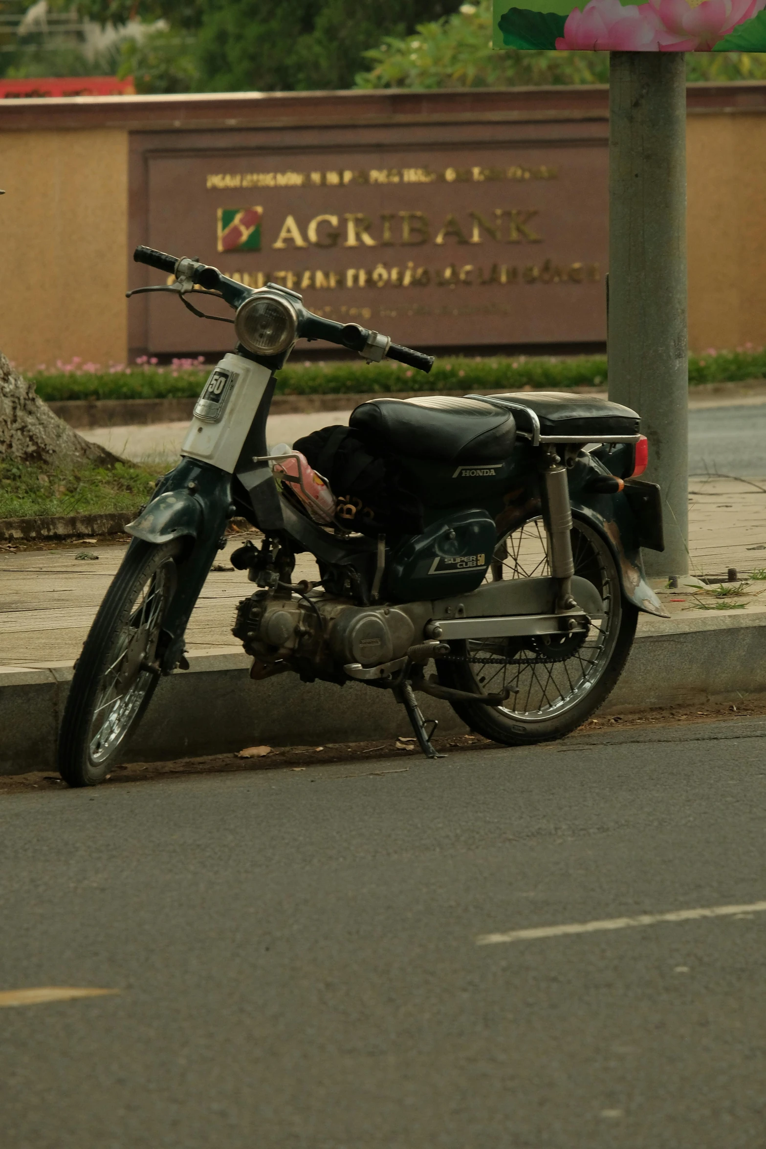 a motorcycle that is parked on the side of the road