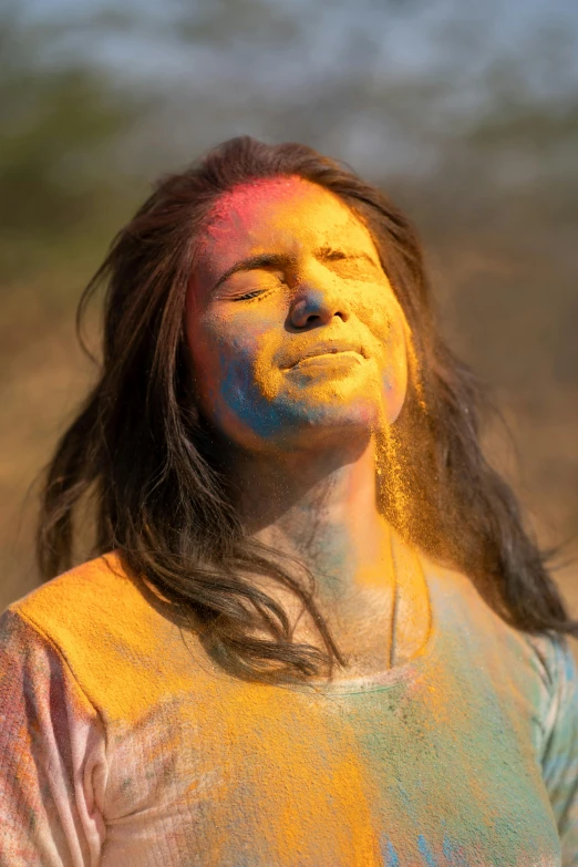 a  is covered in powder while she smiles