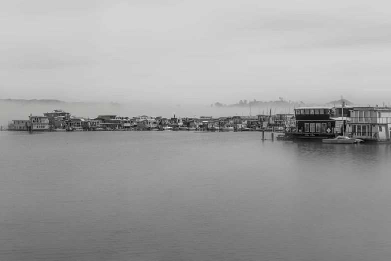 the harbor is full of houses near the city