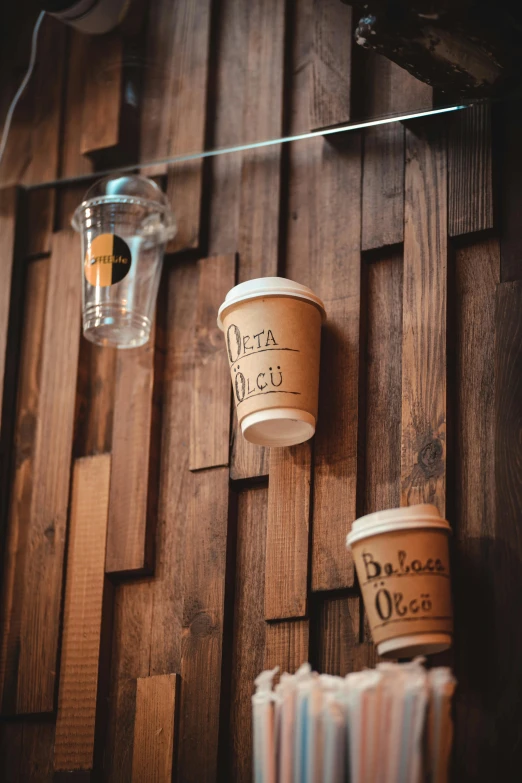 coffee cups on the wall and on the lights in the area