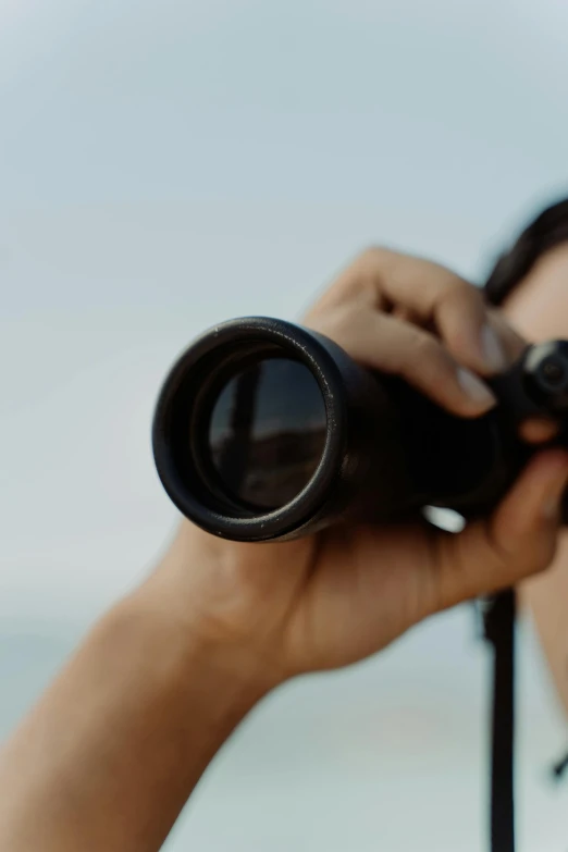 a person with glasses and some sort of equipment