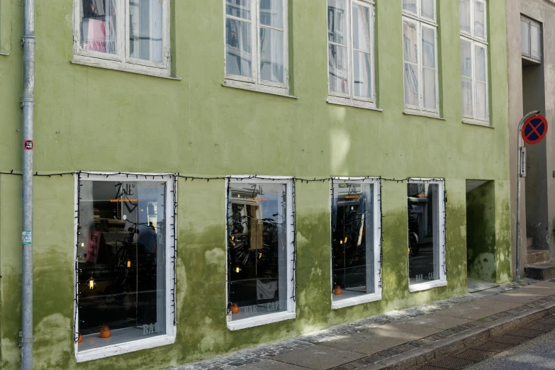 an old fashion shopfront on a street corner