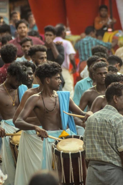 some men in some kind of indian event