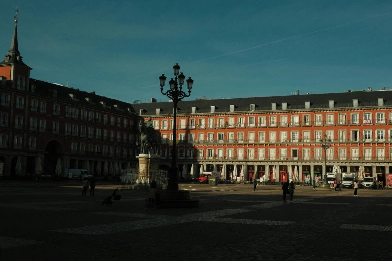 a large building with two large red brick building