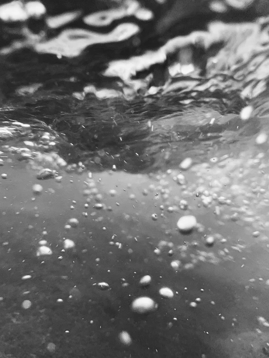 an underwater po of bubbles in the water