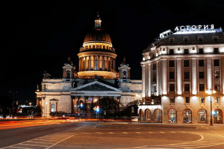 two buildings that are sitting on the side of a street