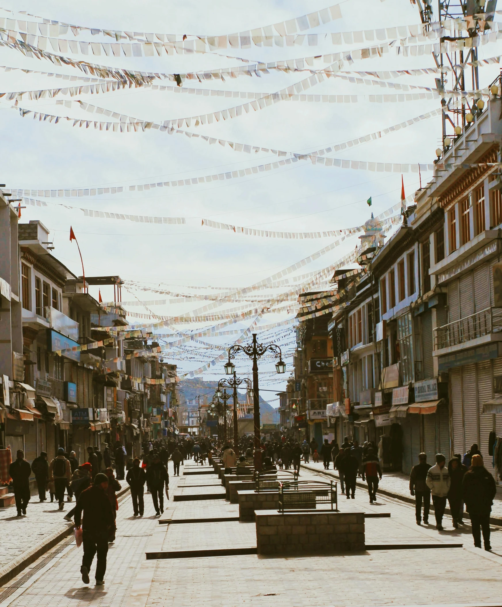 a group of people walking down a street