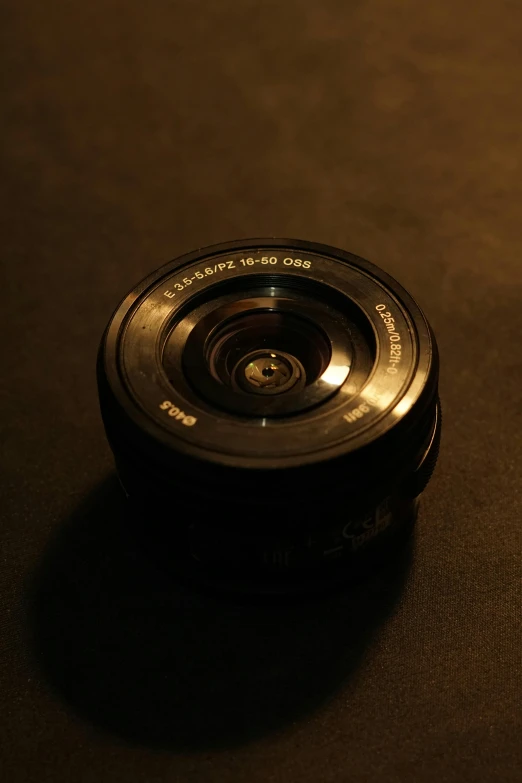 a compact camera is lit up on a surface