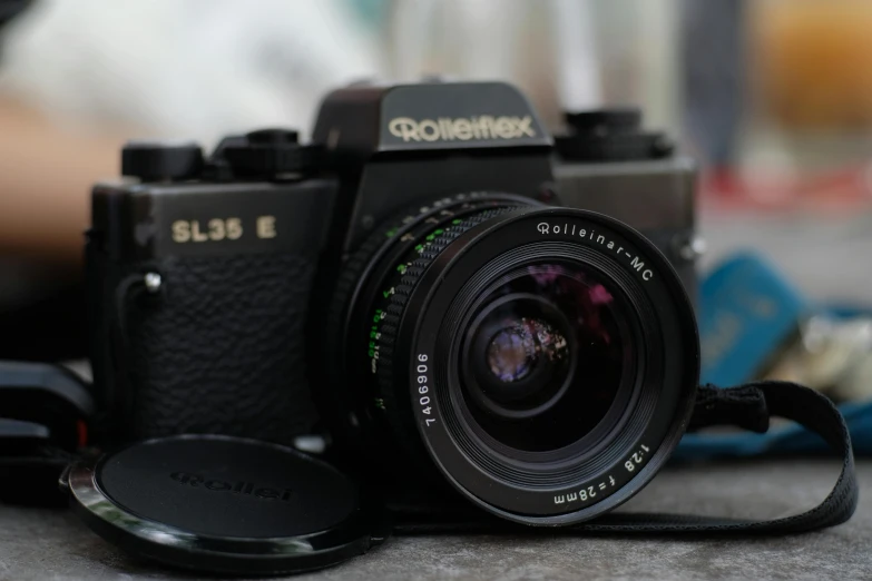 a digital slr camera sitting on top of a table