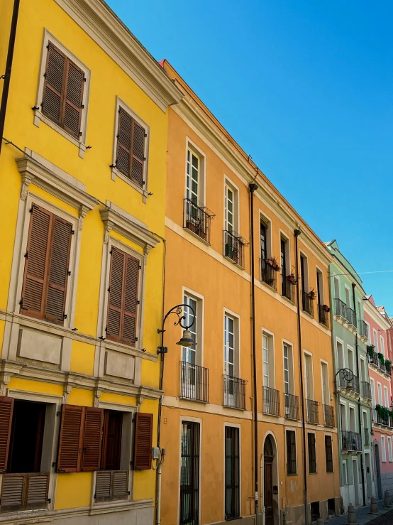 a group of buildings on the street near each other