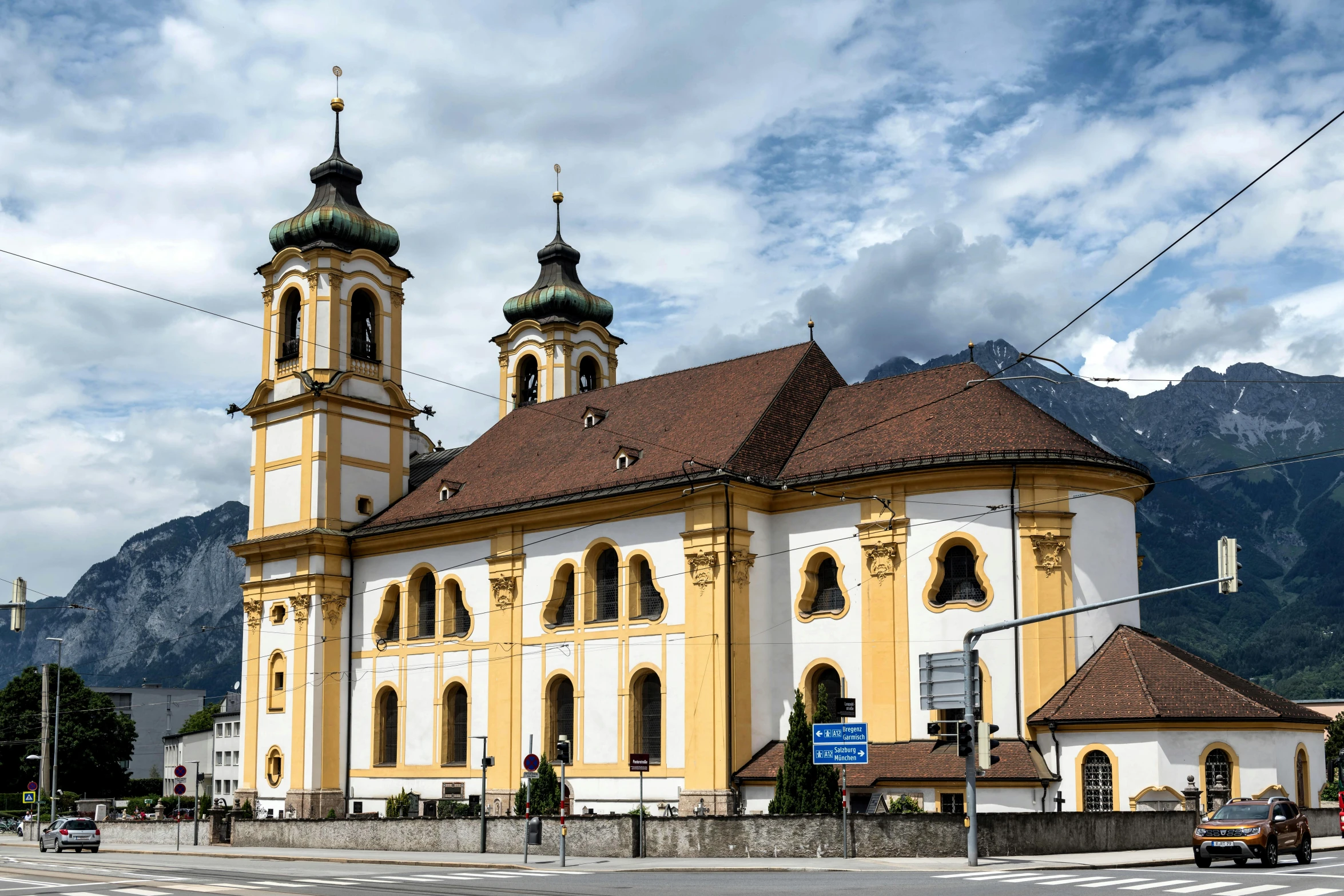 a large cathedral with three towers and two bell towers