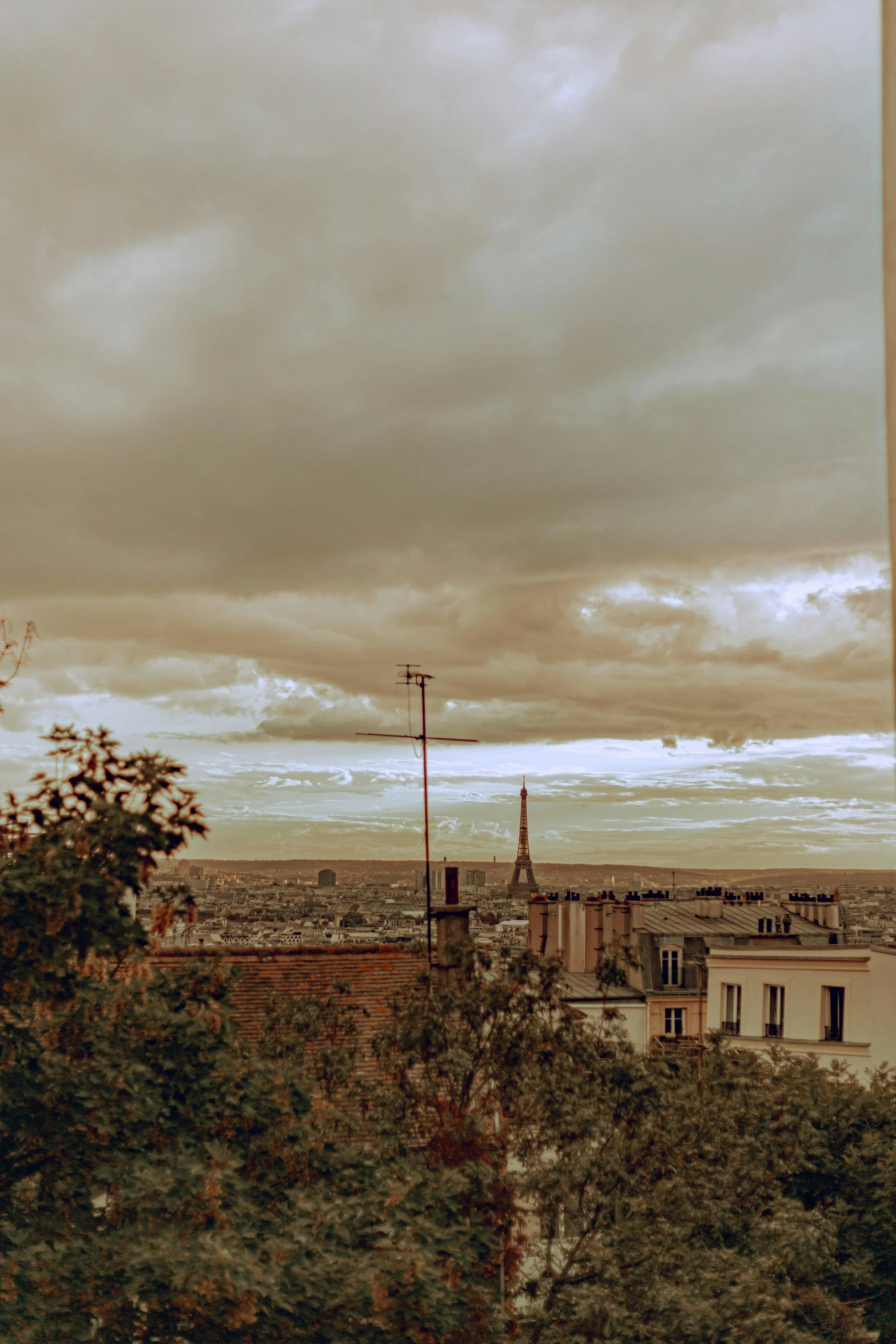 there is a view of the city and clouds