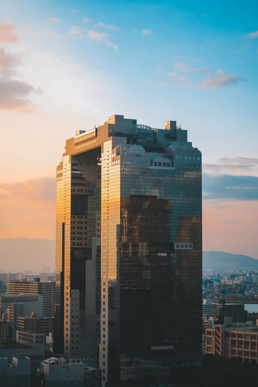 a building that is standing against the sky