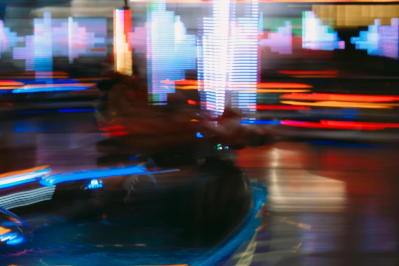 a man rides a wheel boat in a carnival