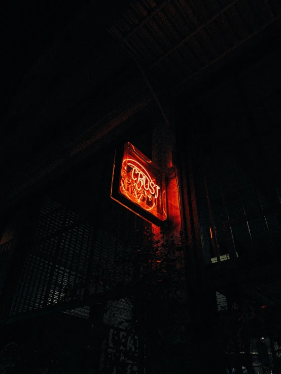 a neon sign with an inscription for pizza on it