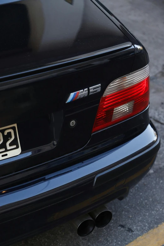 the rear end of a bmw e36 with a license plate