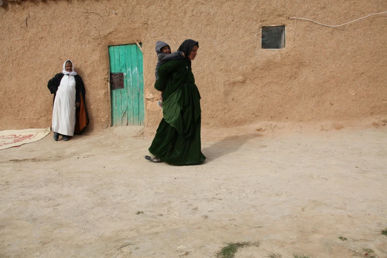 a group of women in traditional arabic dress