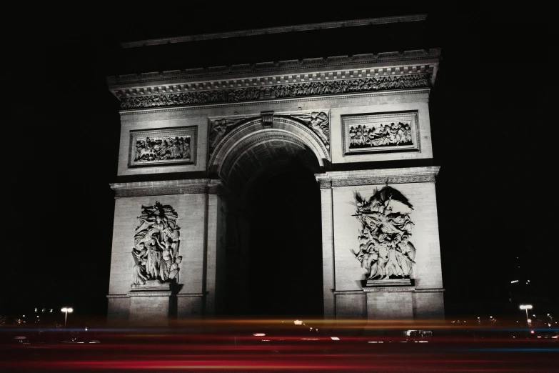 a monument at night with the lights on