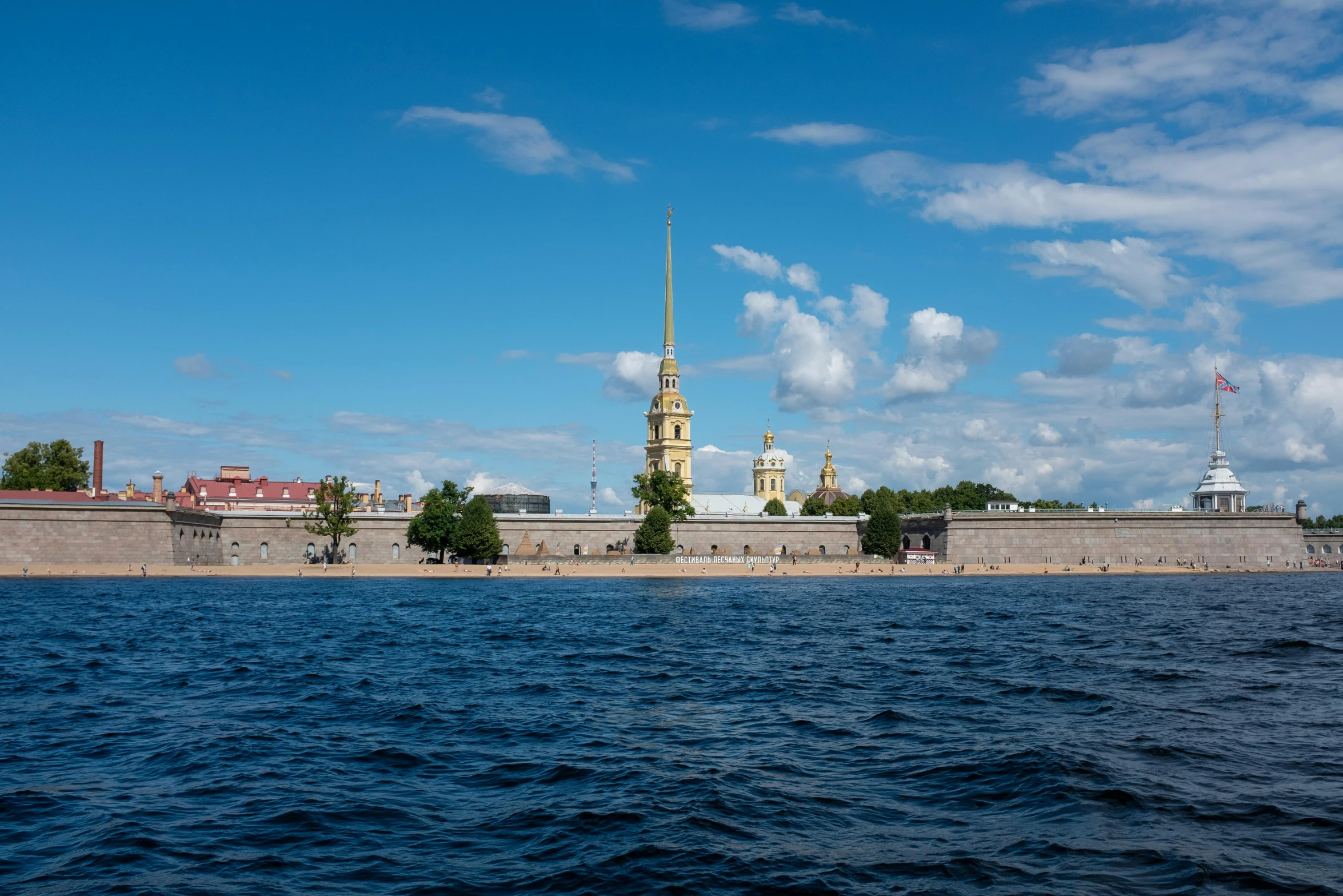 the statue in the center of the old town is by the water