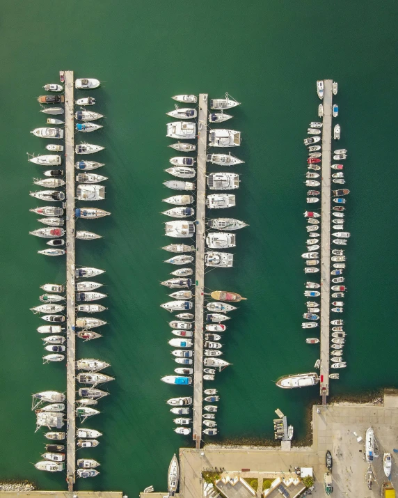 a large number of boats docked in a harbor