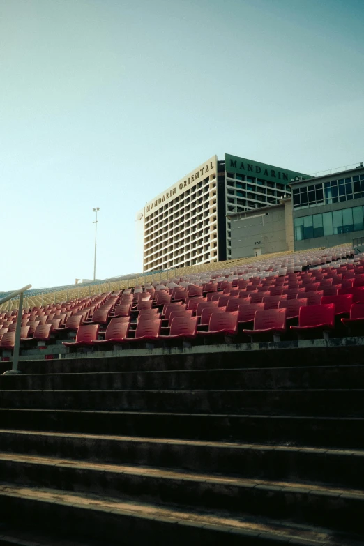 a bunch of chairs that are sitting on a set of stairs