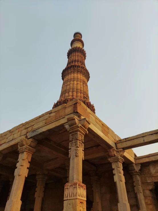 the side view of a large building with pillars