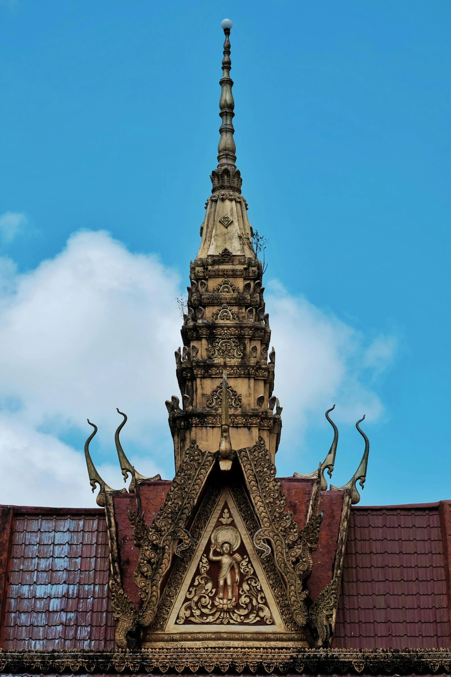 ornate sculptures and statues surrounding an ancient architecture