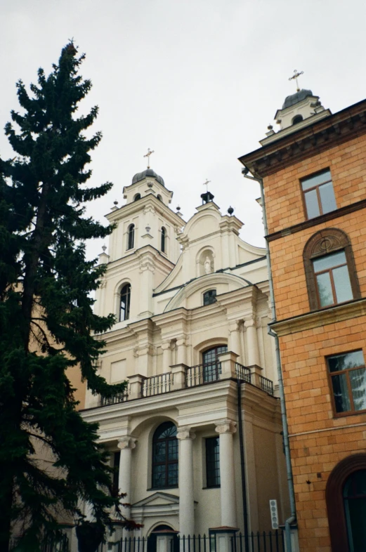 the cathedral has three spires, and is white