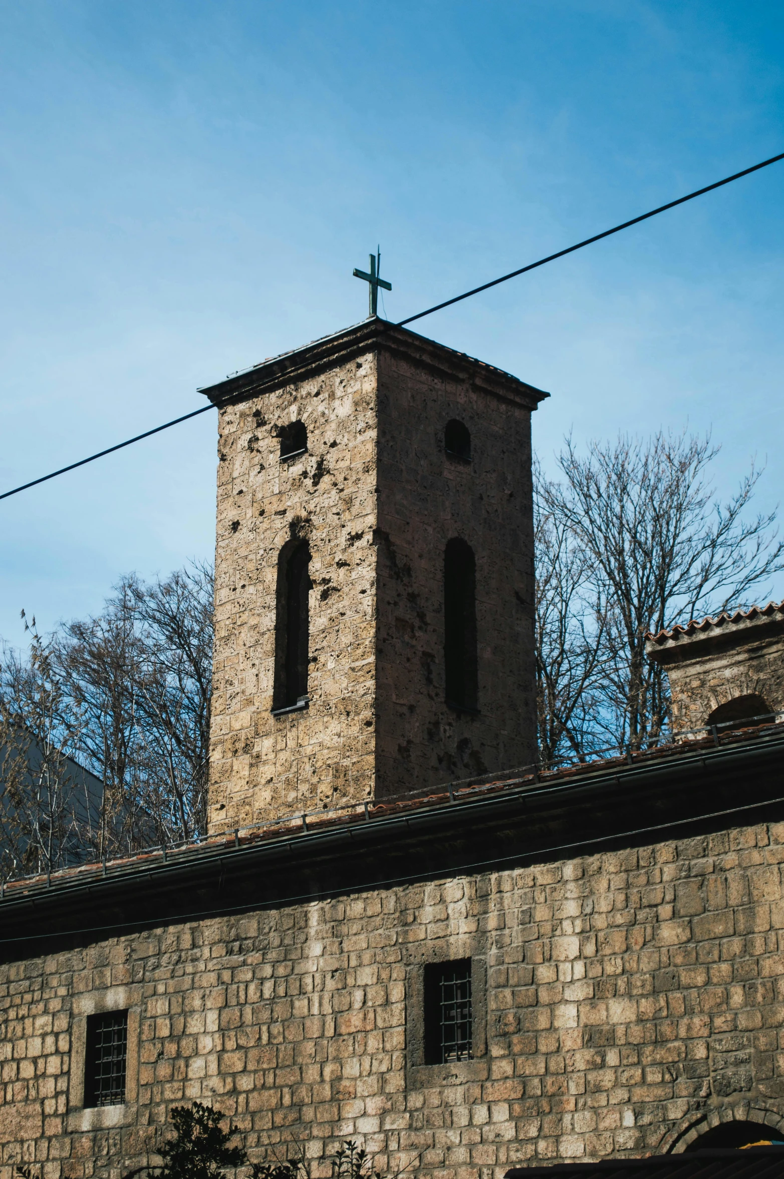 there is a tall tower building made of stone