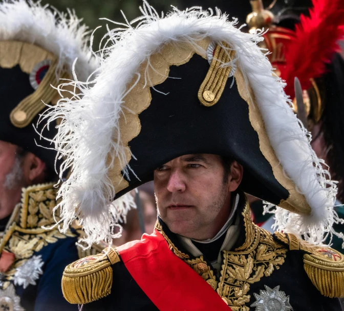 men in costumes and helmets, including men in uniform