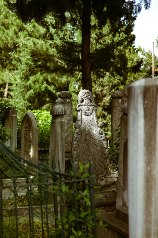 the stone sculpture in the cemetery is ready to be visited
