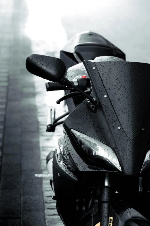 this motorcycle is parked near the curb of a street