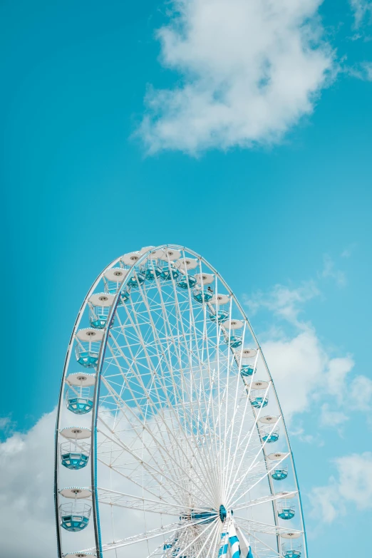 the big wheel has many people around it